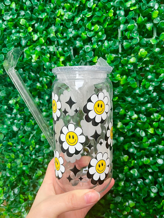 White, yellow and black sparkle flower smiley face 16oz plastic beer can tumbler cup with coloured lid and reusable plastic straw.