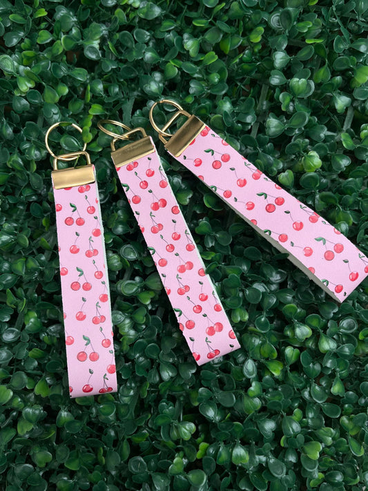 cute pink and red cherry faux leather wristlet car key keyring.