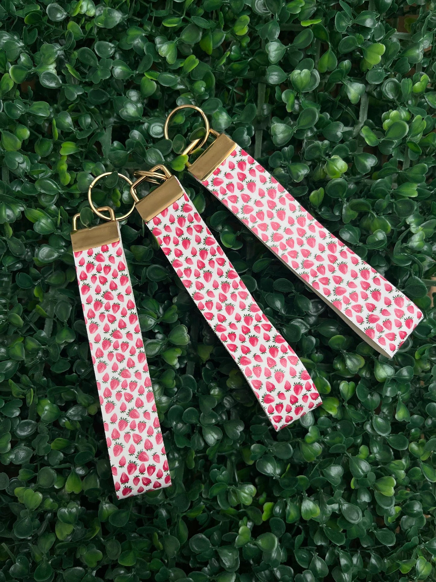 cute white and red strawberry illustration faux leather wristlet car key keyring.