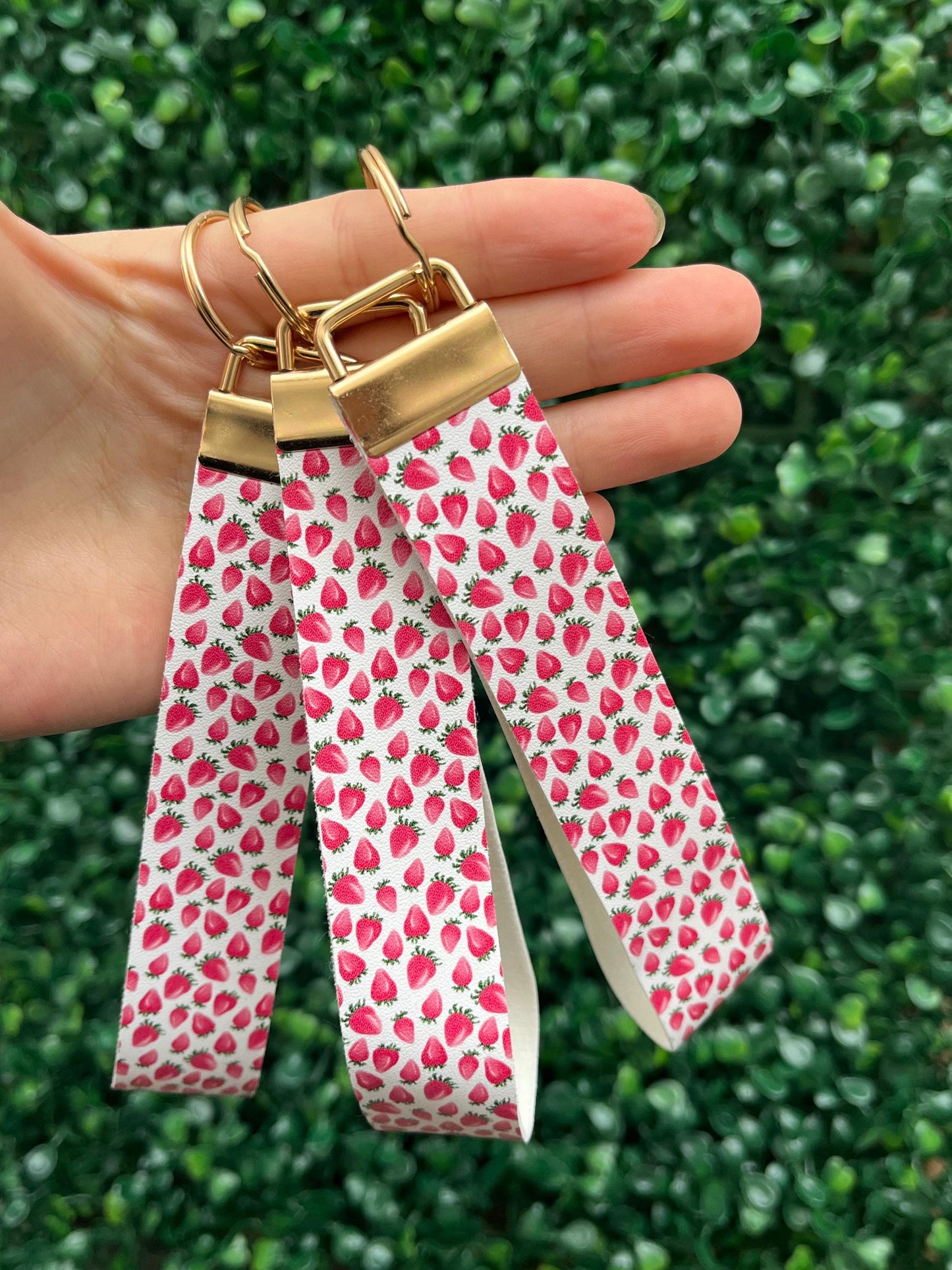 cute white and red strawberry illustration faux leather wristlet car key keyring.