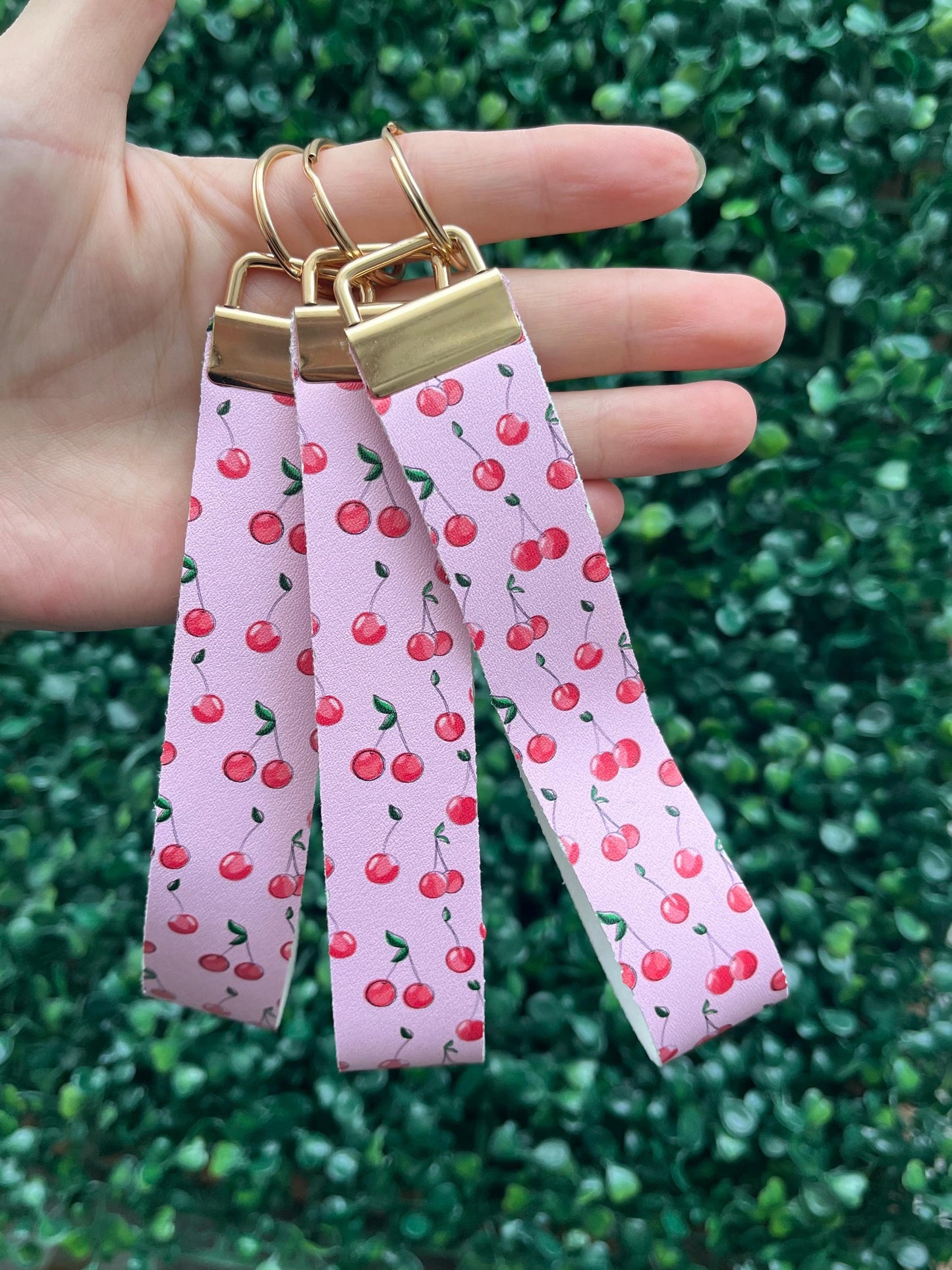cute pink and red cherry faux leather wristlet car key keyring.