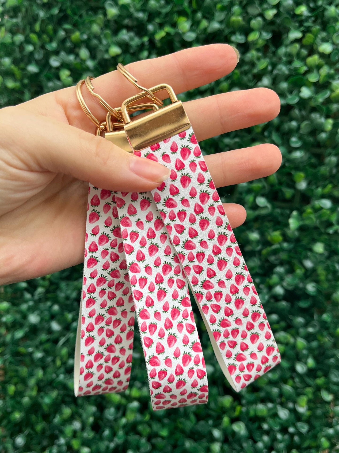 cute white and red strawberry illustration faux leather wristlet car key keyring.