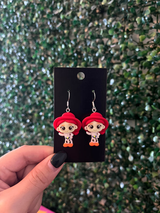 Cowgirl and alien charming 925 sterling silver hook earrings.