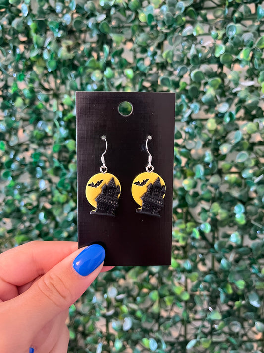 Playful and fun haunted house Halloween 925 sterling silver hook earrings.