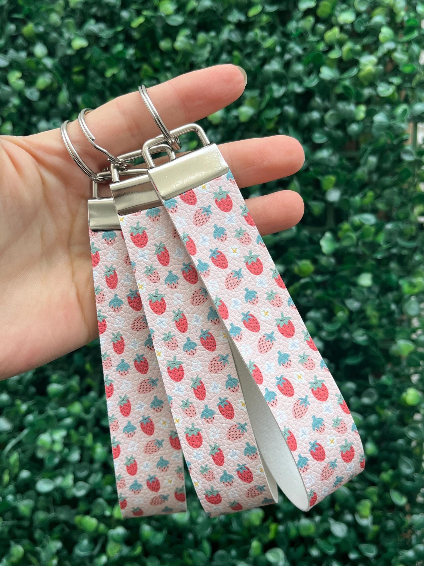 cute pink and red strawberry illustration faux leather wristlet car key keyring.