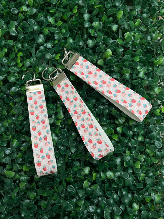 cute pink and red strawberry illustration faux leather wristlet car key keyring.
