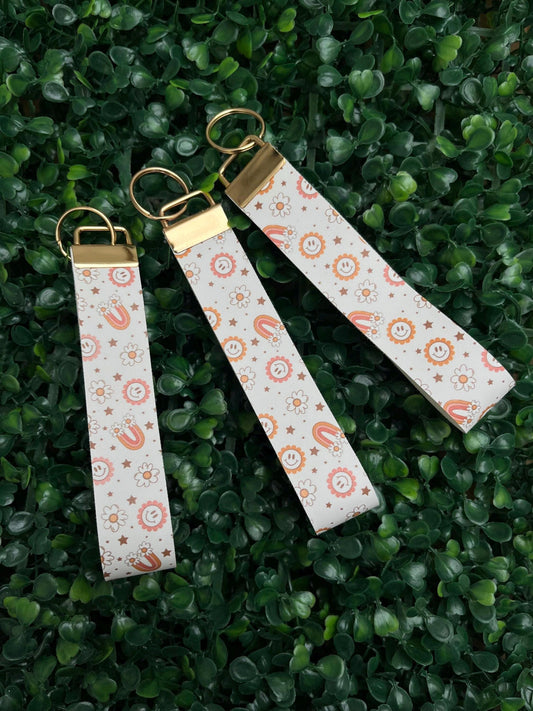 retro rainbow smiley floral orange and peaches faux leather wristlet car key keyring.