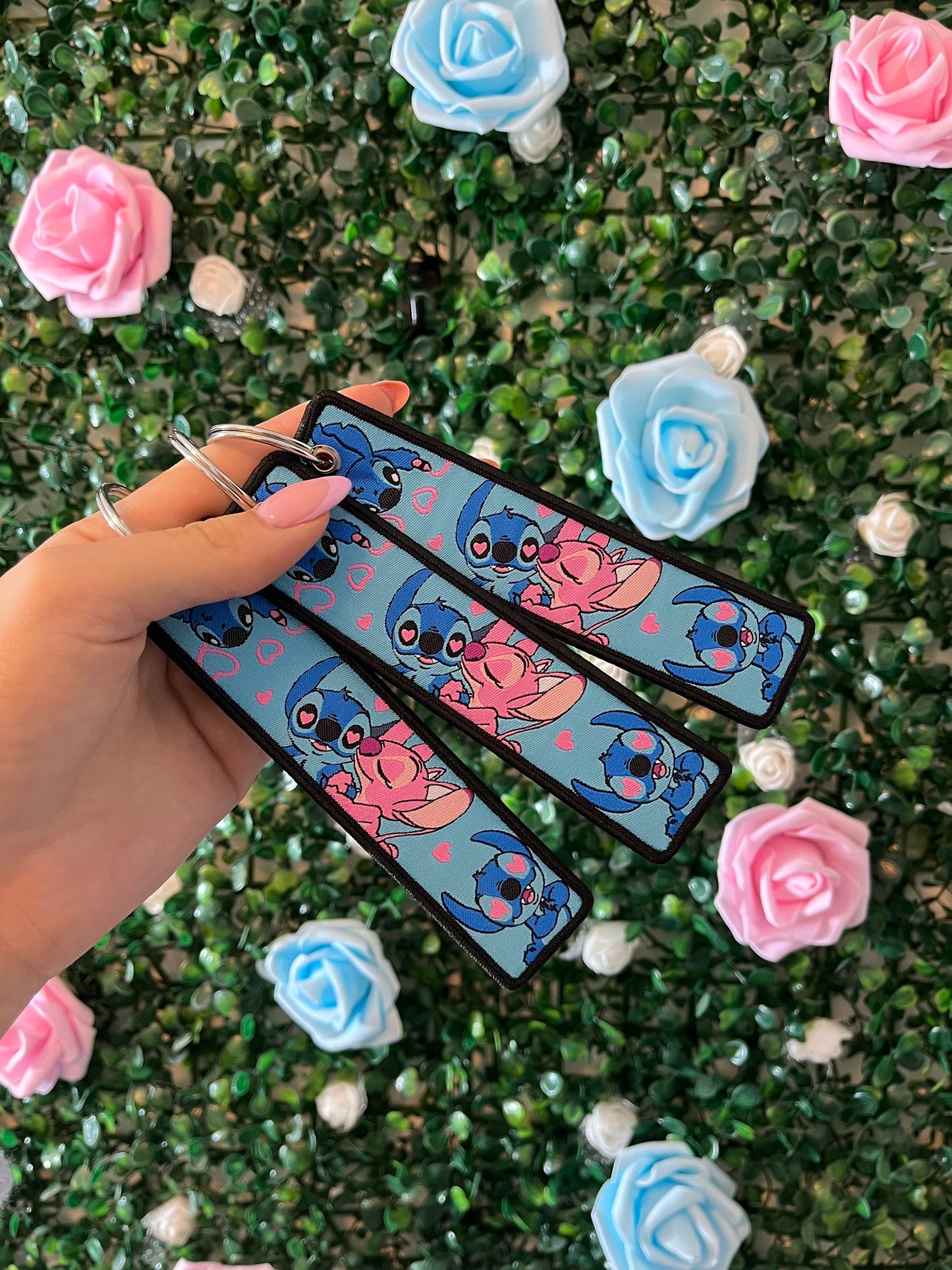 Double sided keyrings blue and pink.